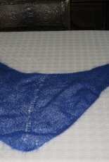 A tiny blue shawl