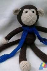 Brown long legged monkey