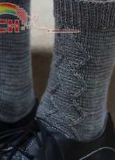 Mister Invested Socks by Meaghan Schmaltz /The Unapologetic Knitter