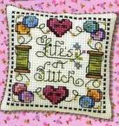 Life's A Stitch Pincushion by Joan Elliott from A Woman's World