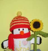 Penguin with sunflower