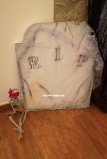 Tombstone and skeleton