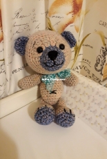 This is bear with blue bow