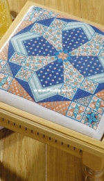 Striking Stitcher - Patterned Footstool by Anne MacGregor from Cross Stitch Gold 118 XSD