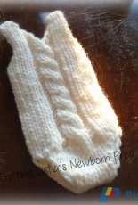 Newborn Prop Cabled Romper by Tjitske de Vries/The Knitting Sisters