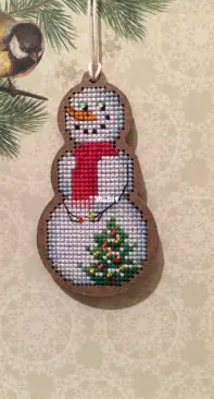 Christmas toys Snowman and Christmas tree on a wooden canvas