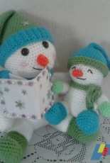 Dad and his son snowman