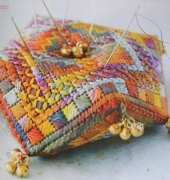 Sue Hawkins' quirky pincushion (biscornu) from Stitch magazine Aug-Sep 2009