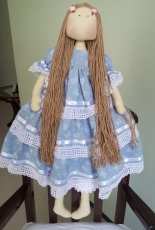 Blue dress doll