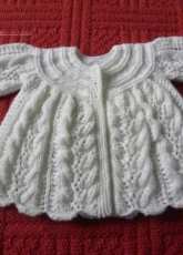 Rosebuds and butterflies  by Claire Topping - Claire's Baby & Doll Handknit Designs