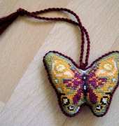 Alfiletero mariposa