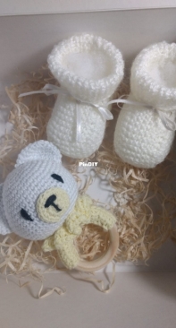Rattle and baby shoes