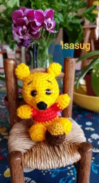 mini Winnie the Pooh with his honeypot