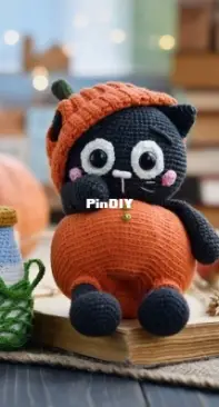 Kru Toys - Halloween cute kitty wearing a pumpkin suit
