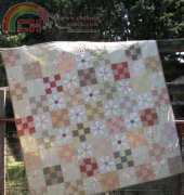 Hatched and Patched-Mill flower quilt