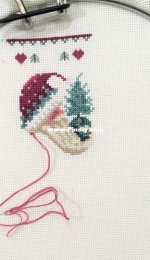 Preparing to celebrate the new year. Santa's embroidery in progress