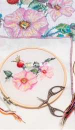 The process of embroidery "May rosehip"