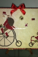 Madame Chantilly Santa on the Bike