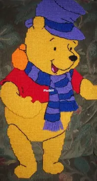 Winnie the Pooh, third member of the carolers