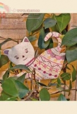 Un chat dans l'aiguille Pique fleurs chat