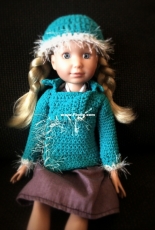 Doll has new coat and hat