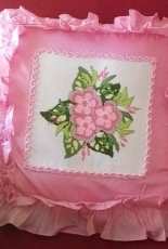 Pillow with pink flowers