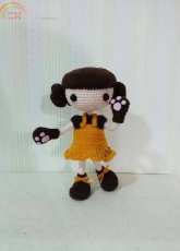 Girl wearing a bear's paw