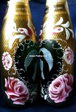 Bottle and glass decor for wedding.